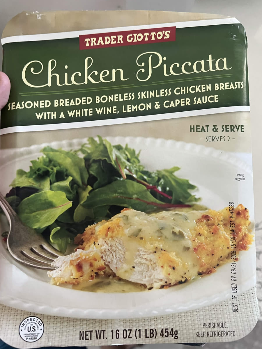 The front of the Trader Giotto's chicken piccata box: seasoned breaded boneless skinless chicken breasts with a white wine, lemon and caper sauce, heat and serve, serves two